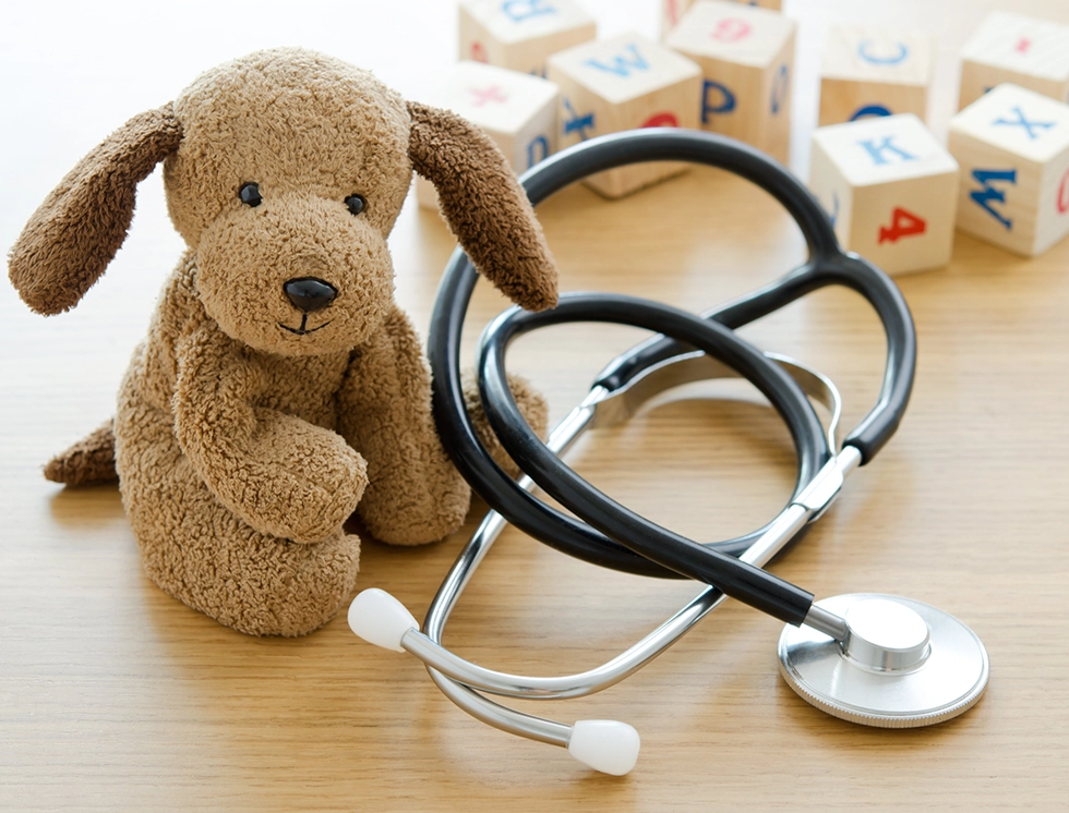 Pediatrics Puppy toy with medical equipment